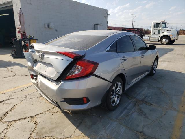 Photo 3 VIN: 2HGFC2F5XJH542673 - HONDA CIVIC LX 