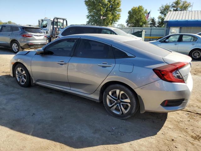 Photo 1 VIN: 2HGFC2F5XJH562387 - HONDA CIVIC LX 