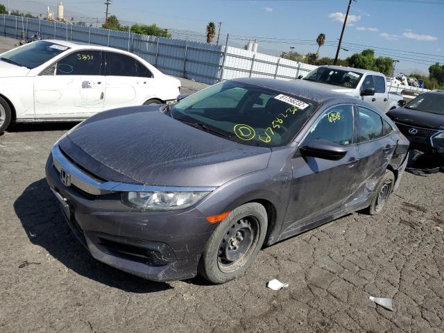 Photo 1 VIN: 2HGFC2F5XJH569517 - HONDA CIVIC LX 