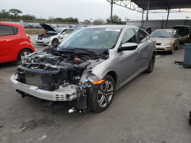 Photo 1 VIN: 2HGFC2F5XJH583661 - HONDA CIVIC LX 