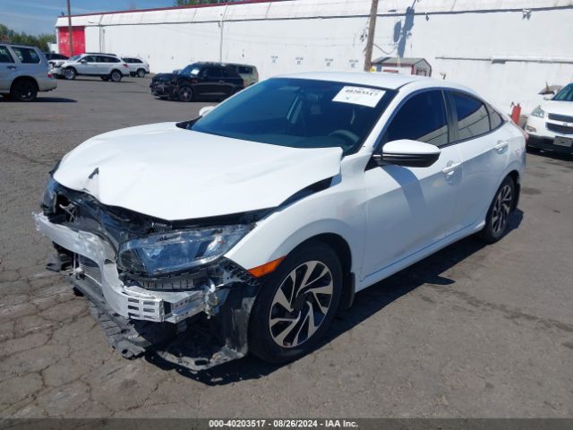 Photo 1 VIN: 2HGFC2F5XJH586737 - HONDA CIVIC 