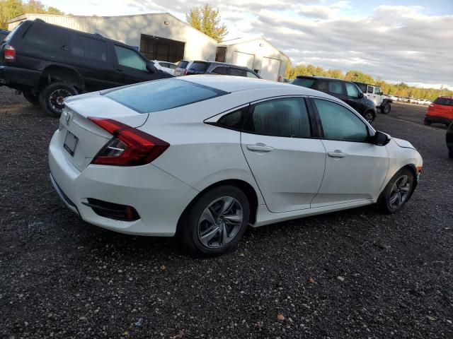 Photo 2 VIN: 2HGFC2F5XKH024080 - HONDA CIVIC LX 