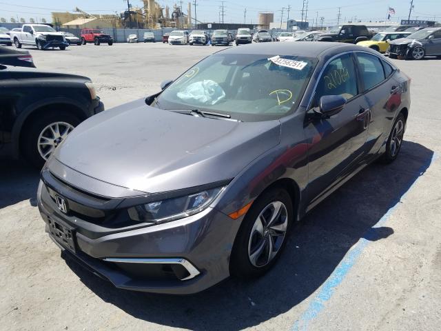 Photo 1 VIN: 2HGFC2F60KH560433 - HONDA CIVIC LX 