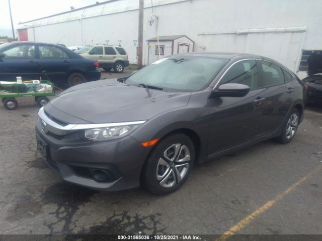 Photo 1 VIN: 2HGFC2F65GH555297 - HONDA CIVIC SEDAN 