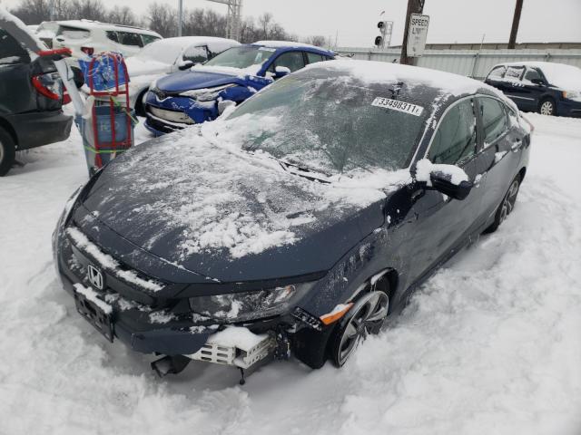 Photo 1 VIN: 2HGFC2F6XKH508839 - HONDA CIVIC LX 