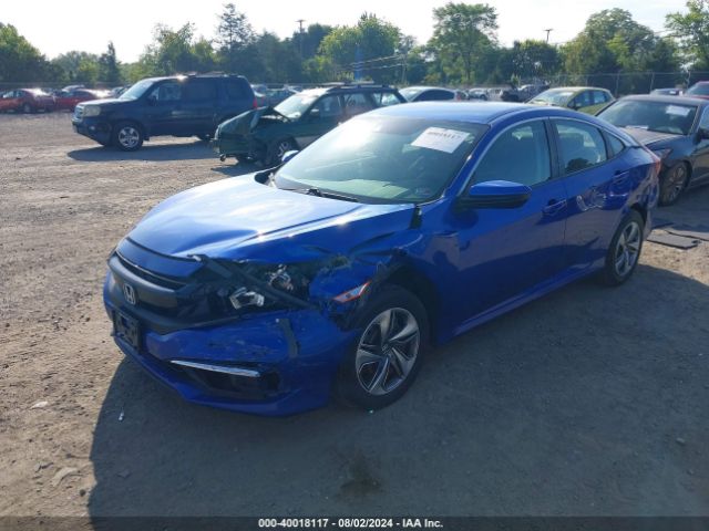 Photo 1 VIN: 2HGFC2F6XKH511059 - HONDA CIVIC 