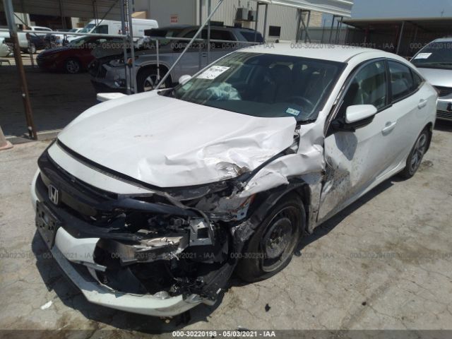 Photo 1 VIN: 2HGFC2F6XKH528055 - HONDA CIVIC SEDAN 