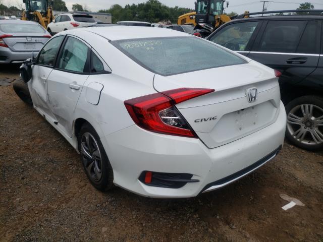 Photo 2 VIN: 2HGFC2F6XKH532011 - HONDA CIVIC LX 