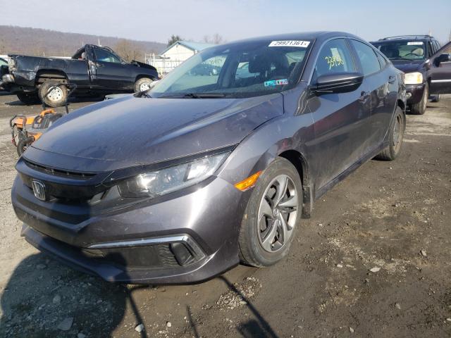 Photo 1 VIN: 2HGFC2F6XKH554705 - HONDA CIVIC LX 