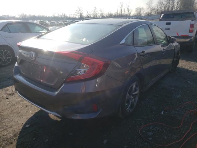 Photo 3 VIN: 2HGFC2F6XKH554705 - HONDA CIVIC LX 