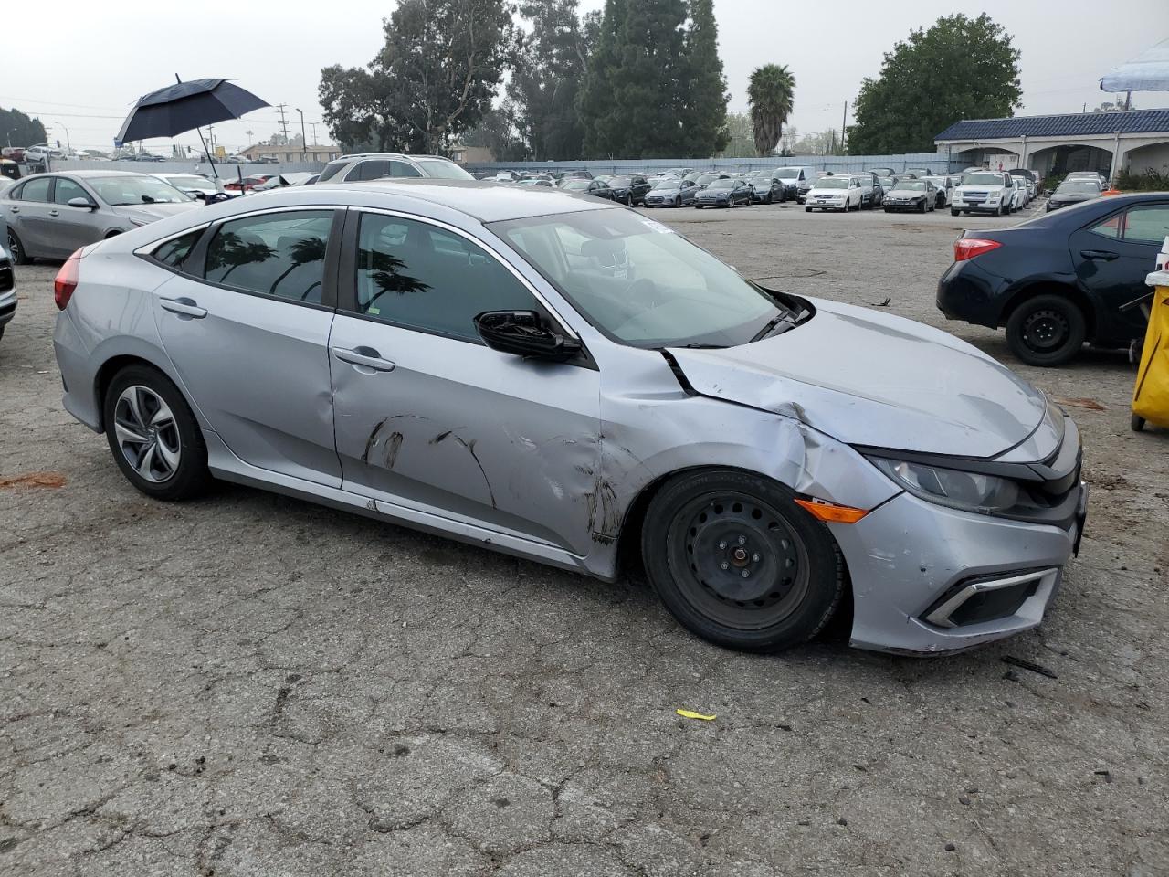 Photo 3 VIN: 2HGFC2F6XKH562707 - HONDA CIVIC 