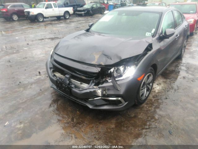 Photo 5 VIN: 2HGFC2F6XKH562738 - HONDA CIVIC SEDAN 