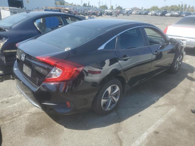 Photo 2 VIN: 2HGFC2F6XKH563758 - HONDA CIVIC LX 