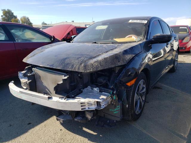 Photo 1 VIN: 2HGFC2F6XKH567700 - HONDA CIVIC LX 