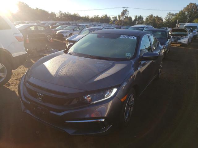 Photo 1 VIN: 2HGFC2F6XKH595867 - HONDA CIVIC LX 