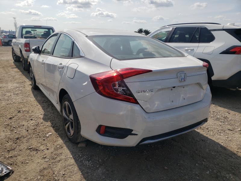 Photo 2 VIN: 2HGFC2F6XKH606253 - HONDA CIVIC LX 