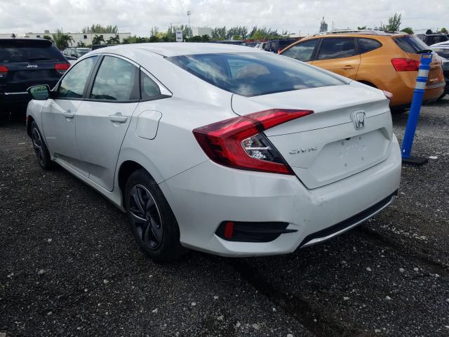 Photo 2 VIN: 2HGFC2F6XKH606253 - HONDA CIVIC LX 