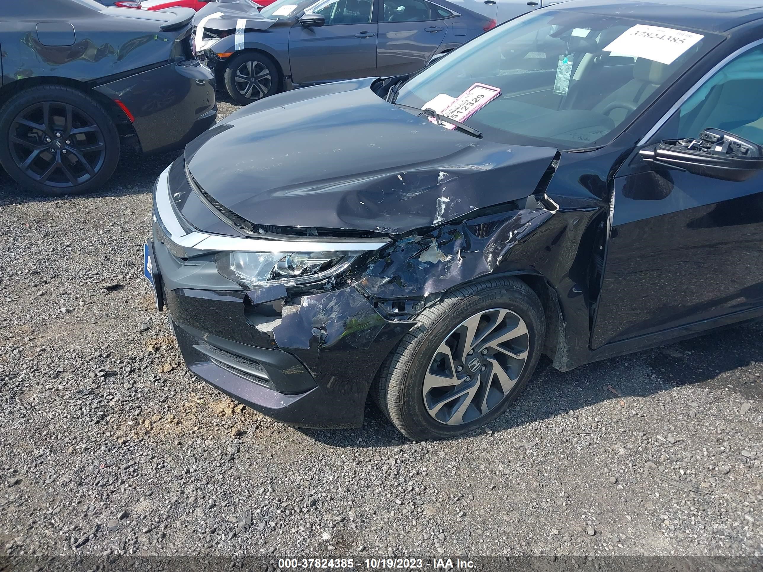 Photo 5 VIN: 2HGFC2F71JH507716 - HONDA CIVIC 