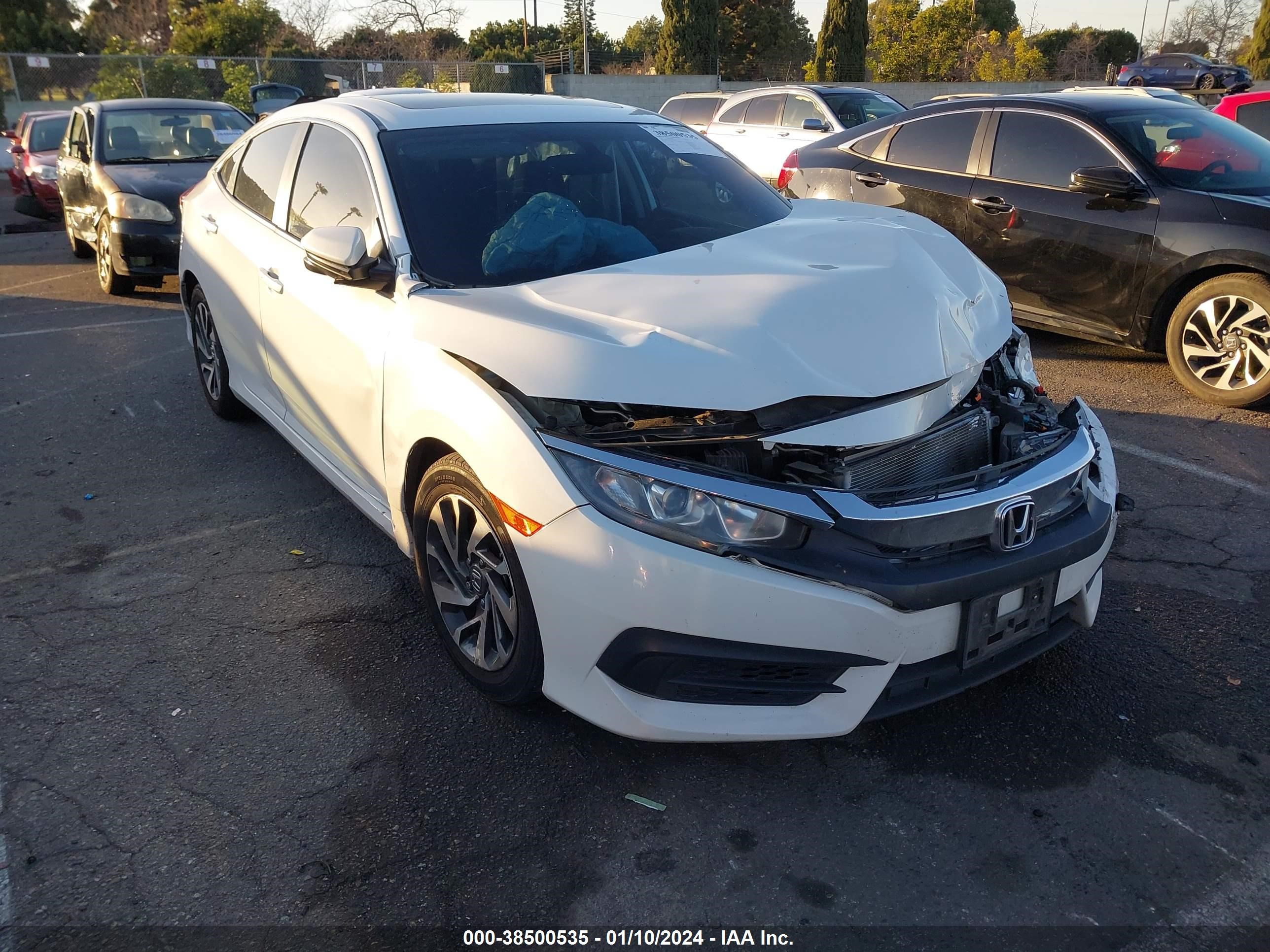 Photo 0 VIN: 2HGFC2F73GH555727 - HONDA CIVIC 