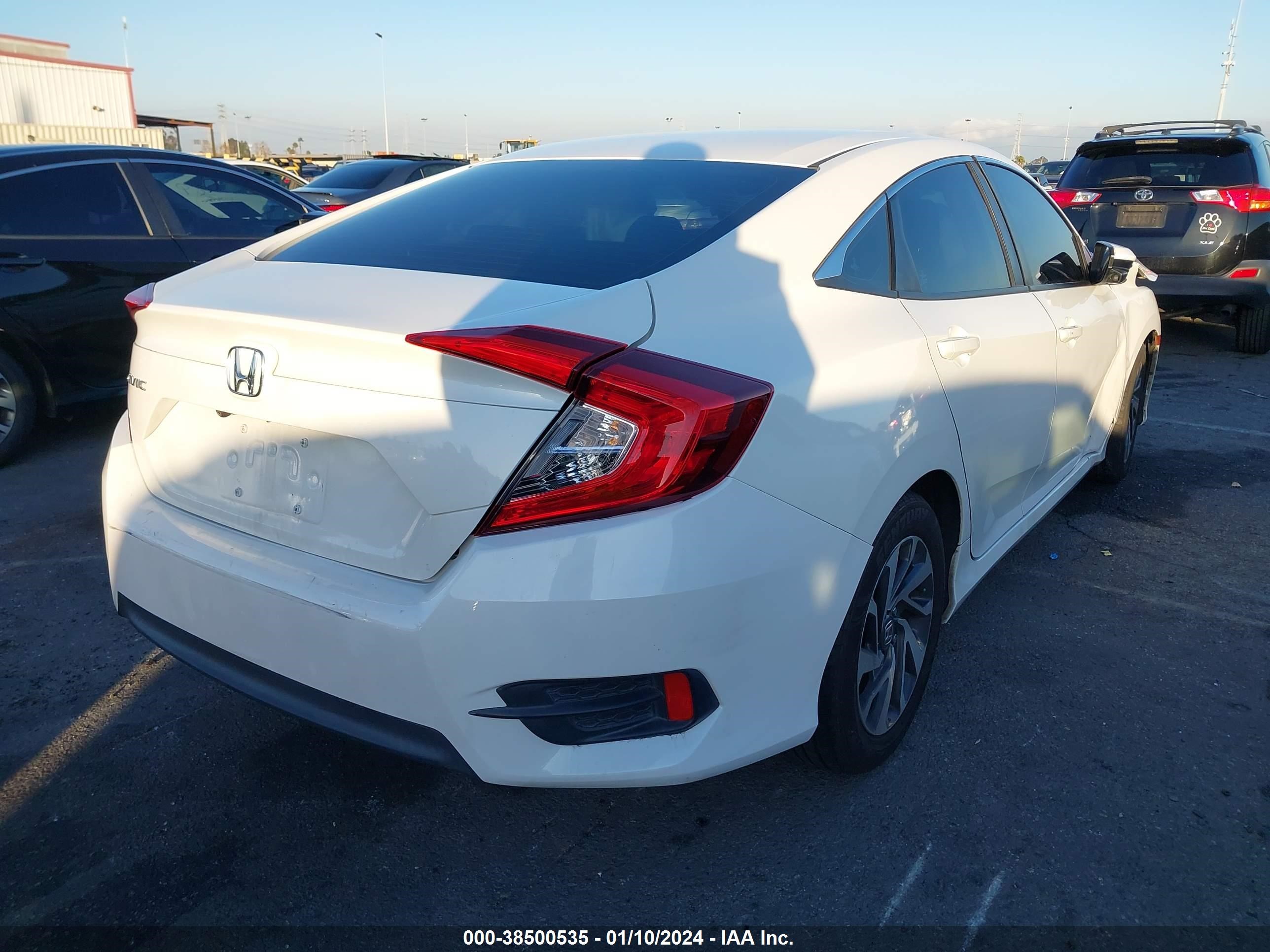 Photo 2 VIN: 2HGFC2F73GH555727 - HONDA CIVIC 