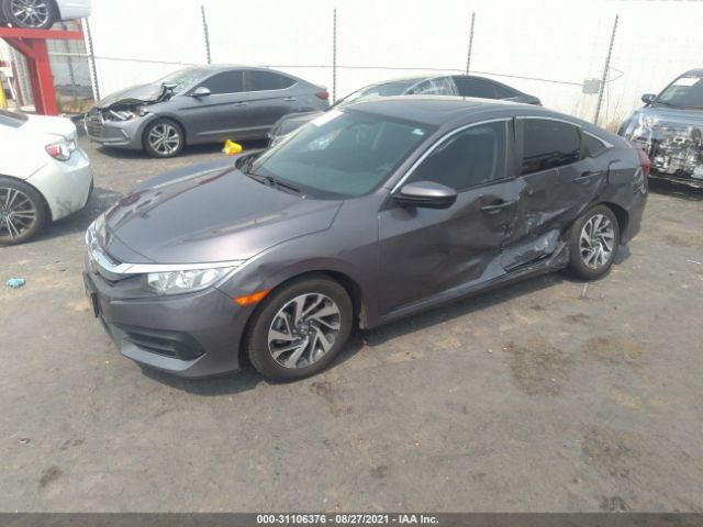 Photo 1 VIN: 2HGFC2F73JH608868 - HONDA CIVIC SEDAN 