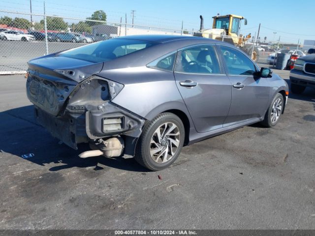 Photo 3 VIN: 2HGFC2F74GH517245 - HONDA CIVIC 