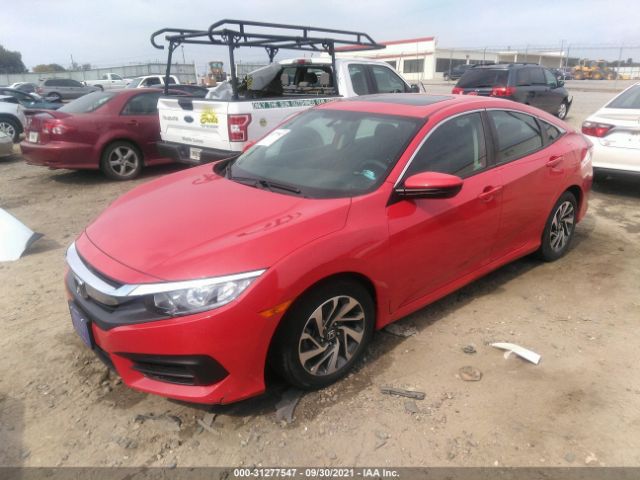 Photo 1 VIN: 2HGFC2F74JH553900 - HONDA CIVIC SEDAN 