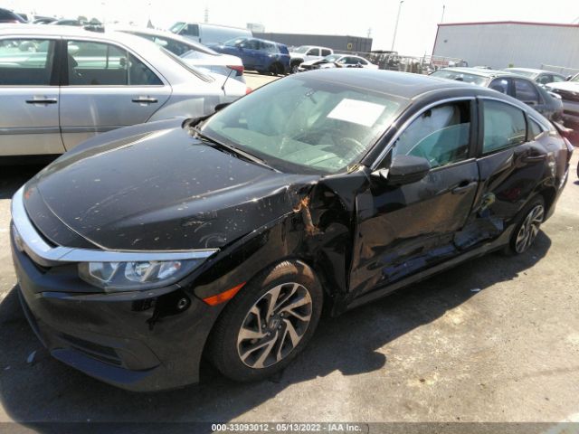 Photo 1 VIN: 2HGFC2F74JH557509 - HONDA CIVIC SEDAN 