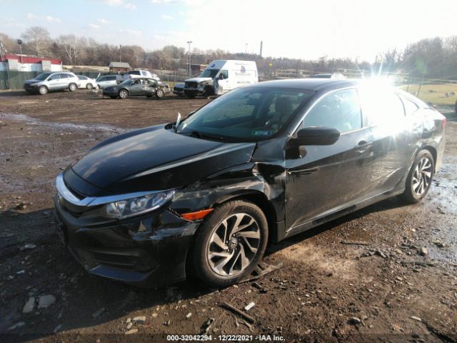 Photo 1 VIN: 2HGFC2F75GH534944 - HONDA CIVIC SEDAN 