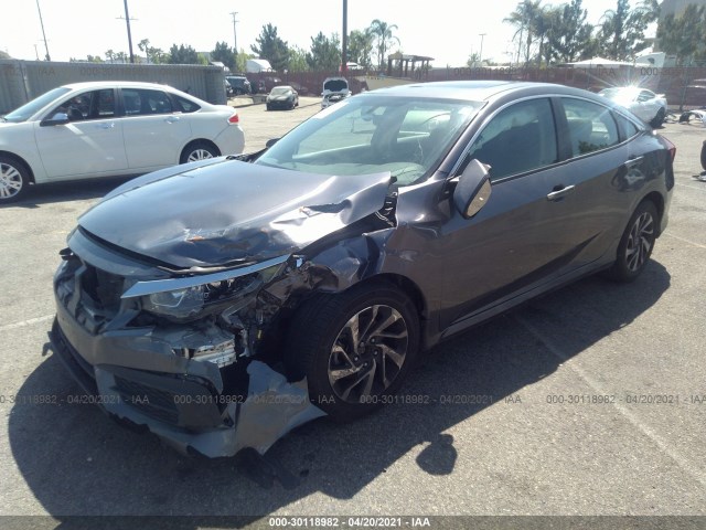 Photo 1 VIN: 2HGFC2F75GH565997 - HONDA CIVIC SEDAN 