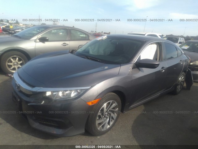 Photo 1 VIN: 2HGFC2F75JH563934 - HONDA CIVIC SEDAN 