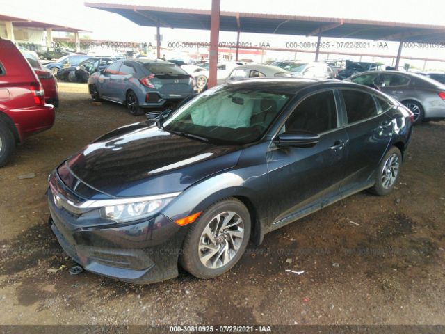 Photo 1 VIN: 2HGFC2F75JH565490 - HONDA CIVIC SEDAN 