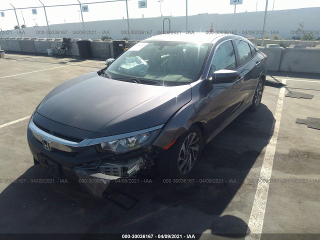 Photo 1 VIN: 2HGFC2F75JH600061 - HONDA CIVIC SEDAN 