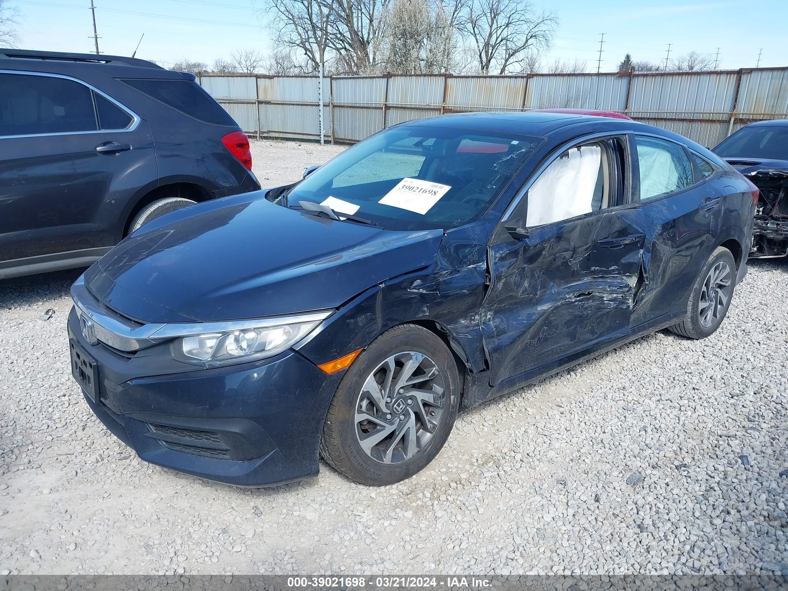 Photo 1 VIN: 2HGFC2F75JH606457 - HONDA CIVIC 