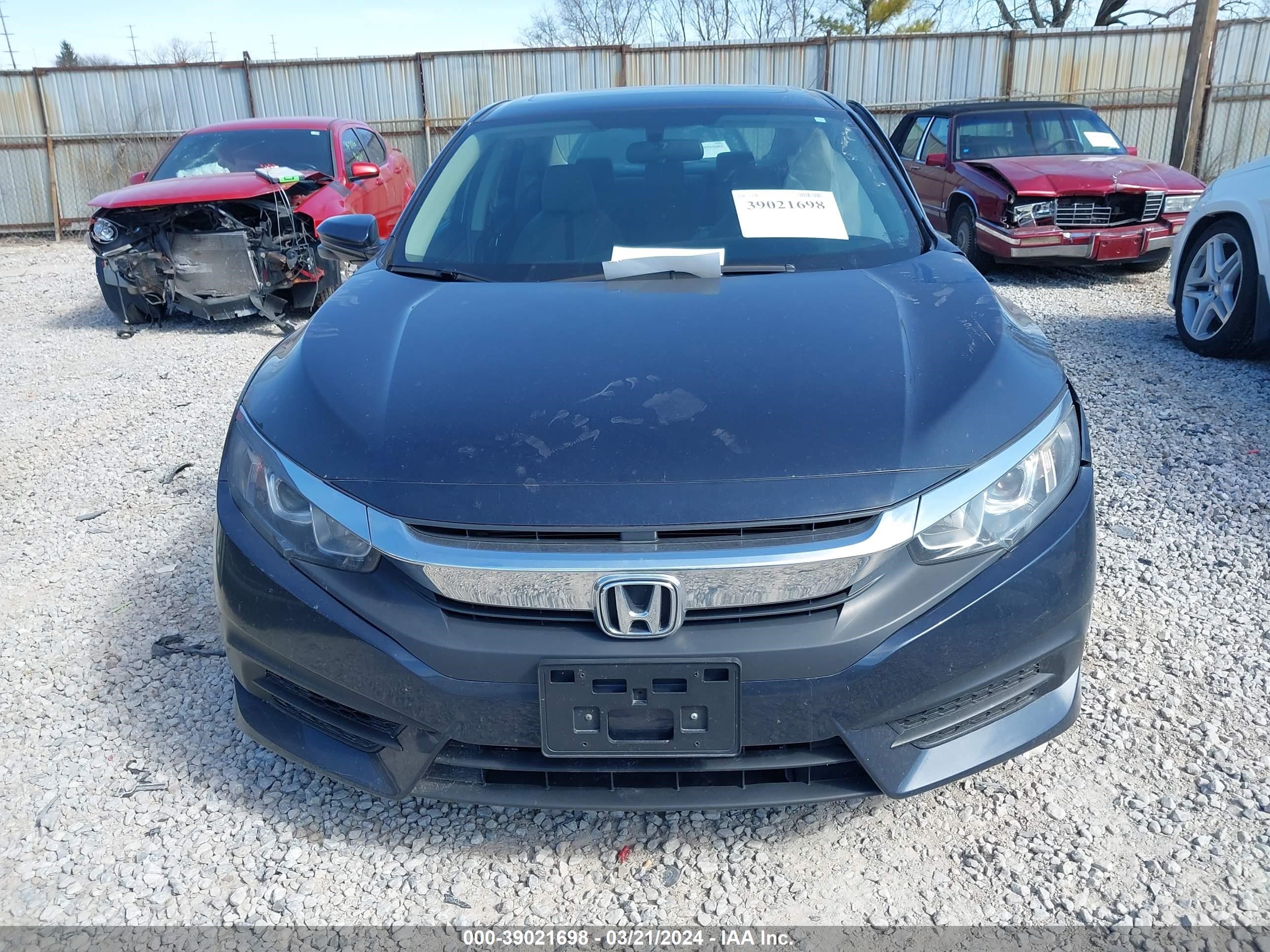 Photo 11 VIN: 2HGFC2F75JH606457 - HONDA CIVIC 