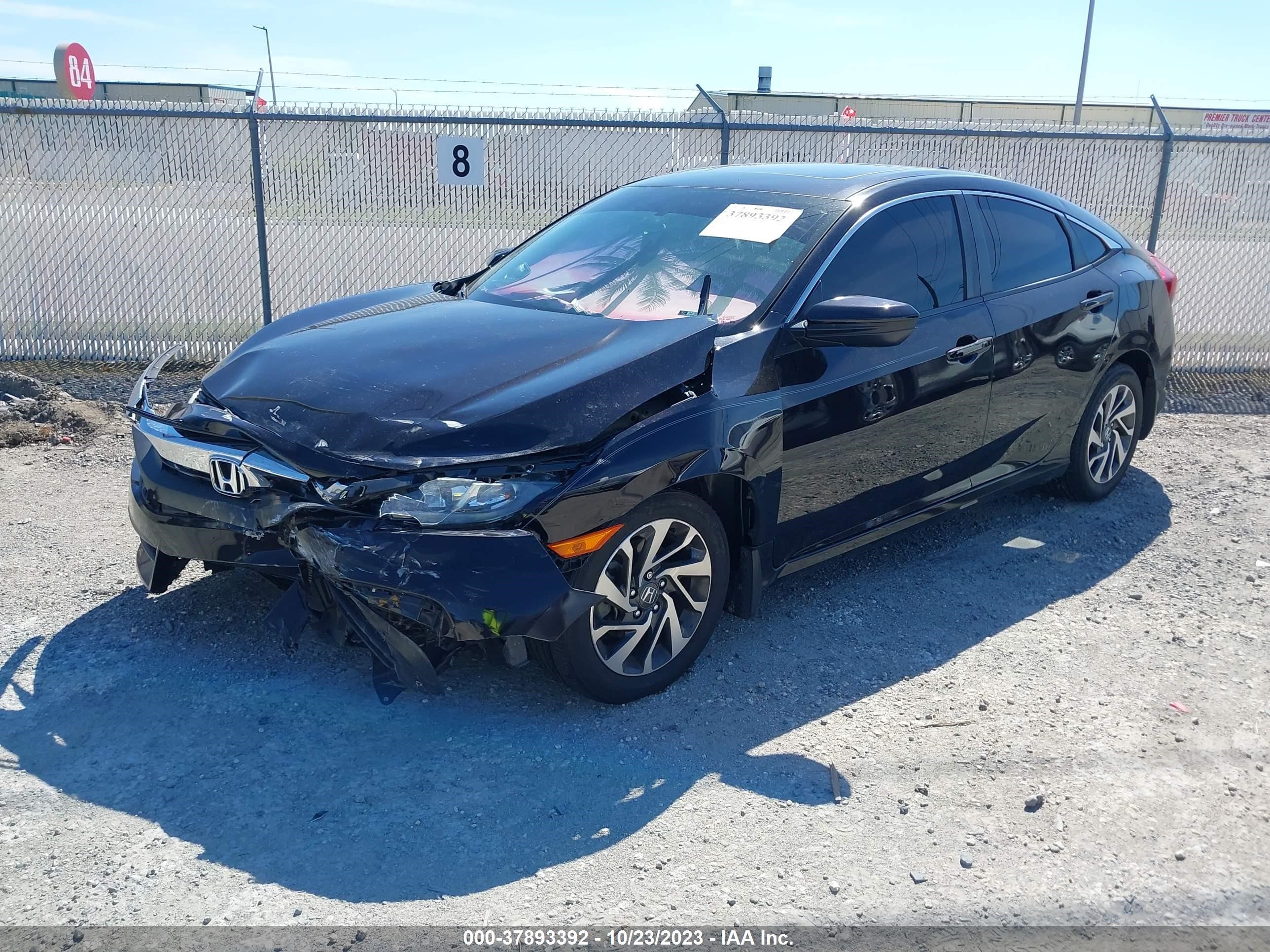 Photo 1 VIN: 2HGFC2F77JH591394 - HONDA CIVIC 