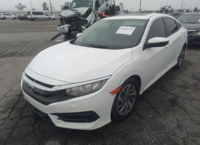 Photo 1 VIN: 2HGFC2F78GH566271 - HONDA CIVIC SEDAN 