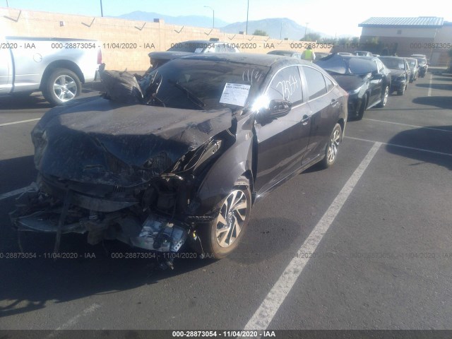 Photo 1 VIN: 2HGFC2F7XGH560696 - HONDA CIVIC SEDAN 