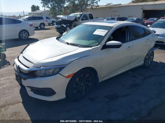 Photo 1 VIN: 2HGFC2F7XGH562688 - HONDA CIVIC 