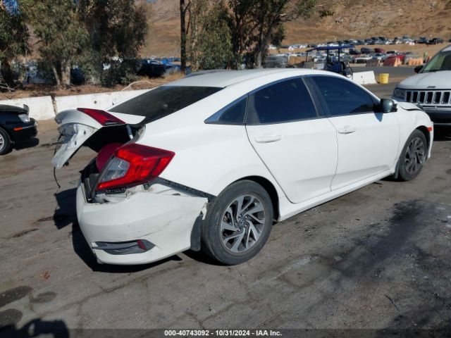 Photo 3 VIN: 2HGFC2F7XGH562688 - HONDA CIVIC 