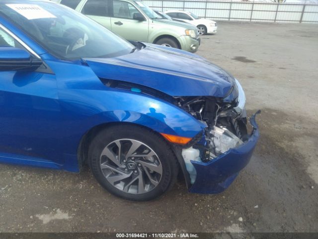 Photo 5 VIN: 2HGFC2F7XJH590739 - HONDA CIVIC SEDAN 