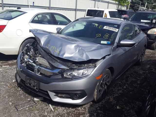 Photo 1 VIN: 2HGFC4A58JH302878 - HONDA CIVIC LX 