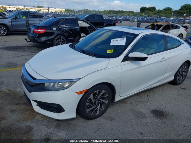 Photo 1 VIN: 2HGFC4B04GH303909 - HONDA CIVIC 