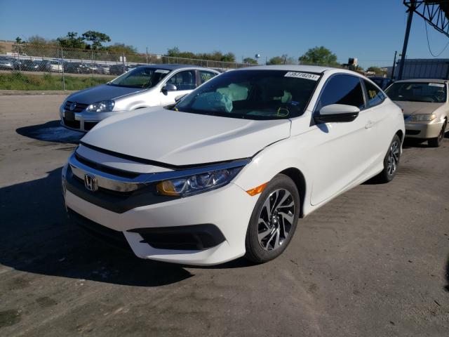 Photo 1 VIN: 2HGFC4B57GH311868 - HONDA CIVIC LX 