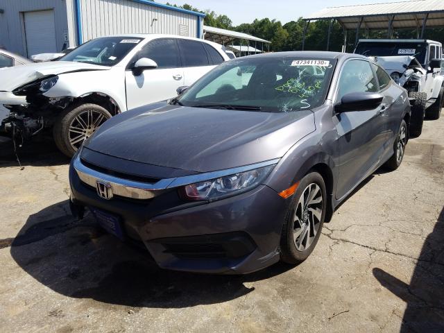 Photo 1 VIN: 2HGFC4B5XGH303599 - HONDA CIVIC LX 