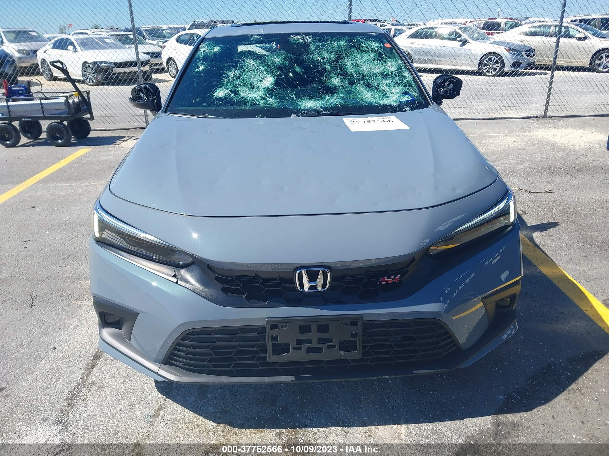 Photo 11 VIN: 2HGFE1E59PH474347 - HONDA CIVIC 