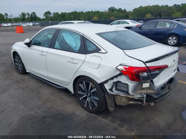 Photo 2 VIN: 2HGFE1F74PH324047 - HONDA CIVIC 