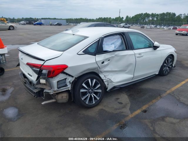 Photo 3 VIN: 2HGFE1F74PH324047 - HONDA CIVIC 