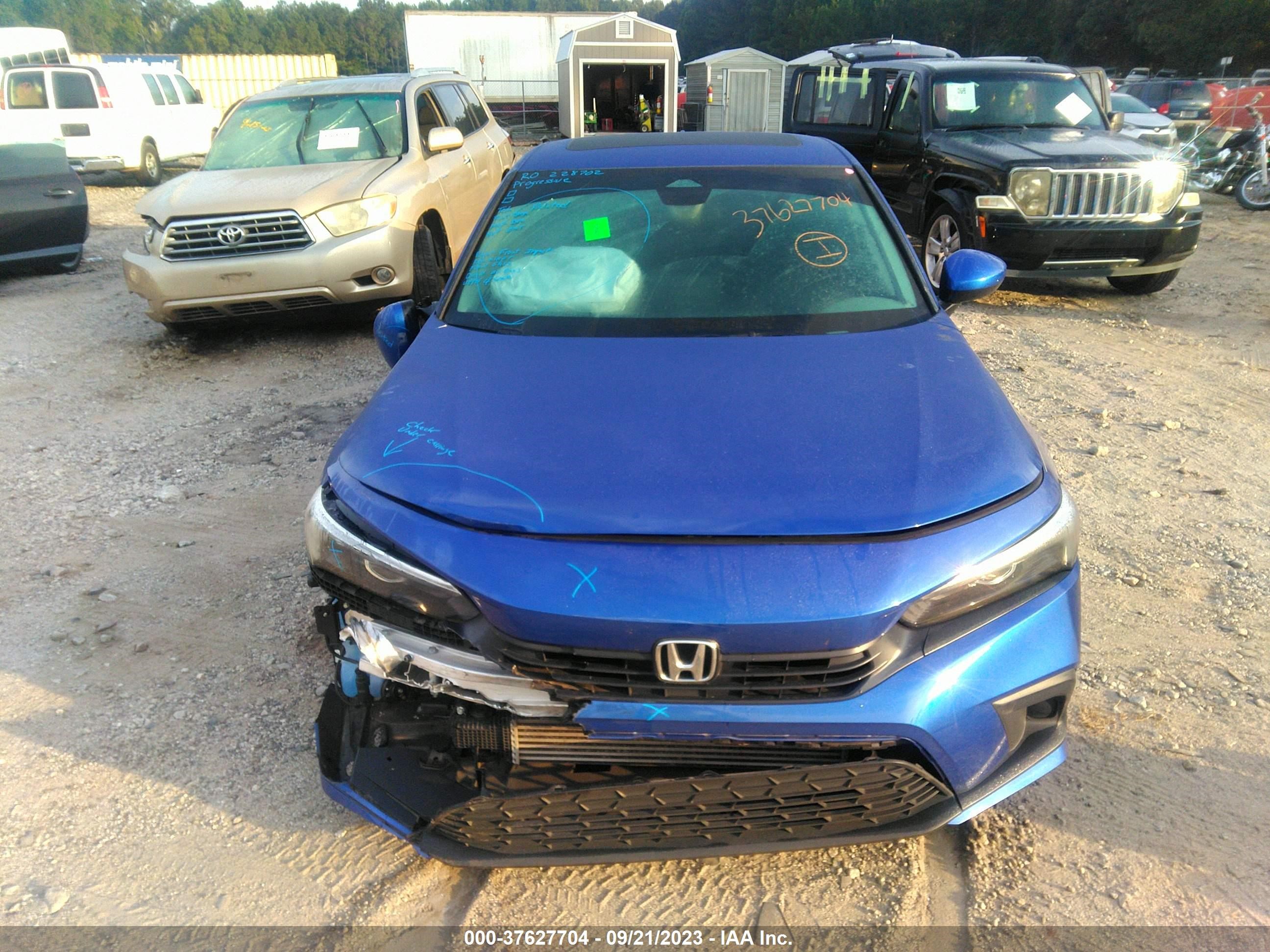 Photo 11 VIN: 2HGFE1F7XNH304124 - HONDA CIVIC 