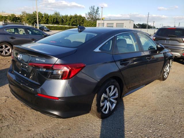 Photo 3 VIN: 2HGFE2F22NH517997 - HONDA CIVIC LX 